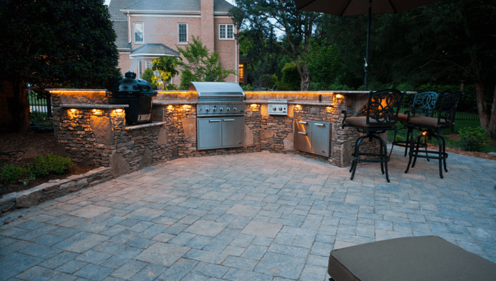Beautiful Scenery Of Outdoor Kitchen With Lighting Feature